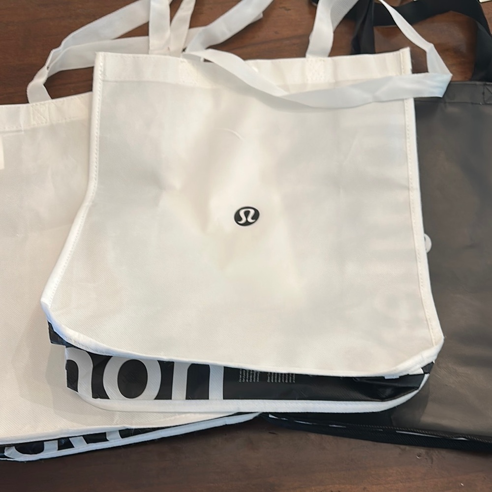 Lululemon Athletica White and Black shoppers! All for one price!
